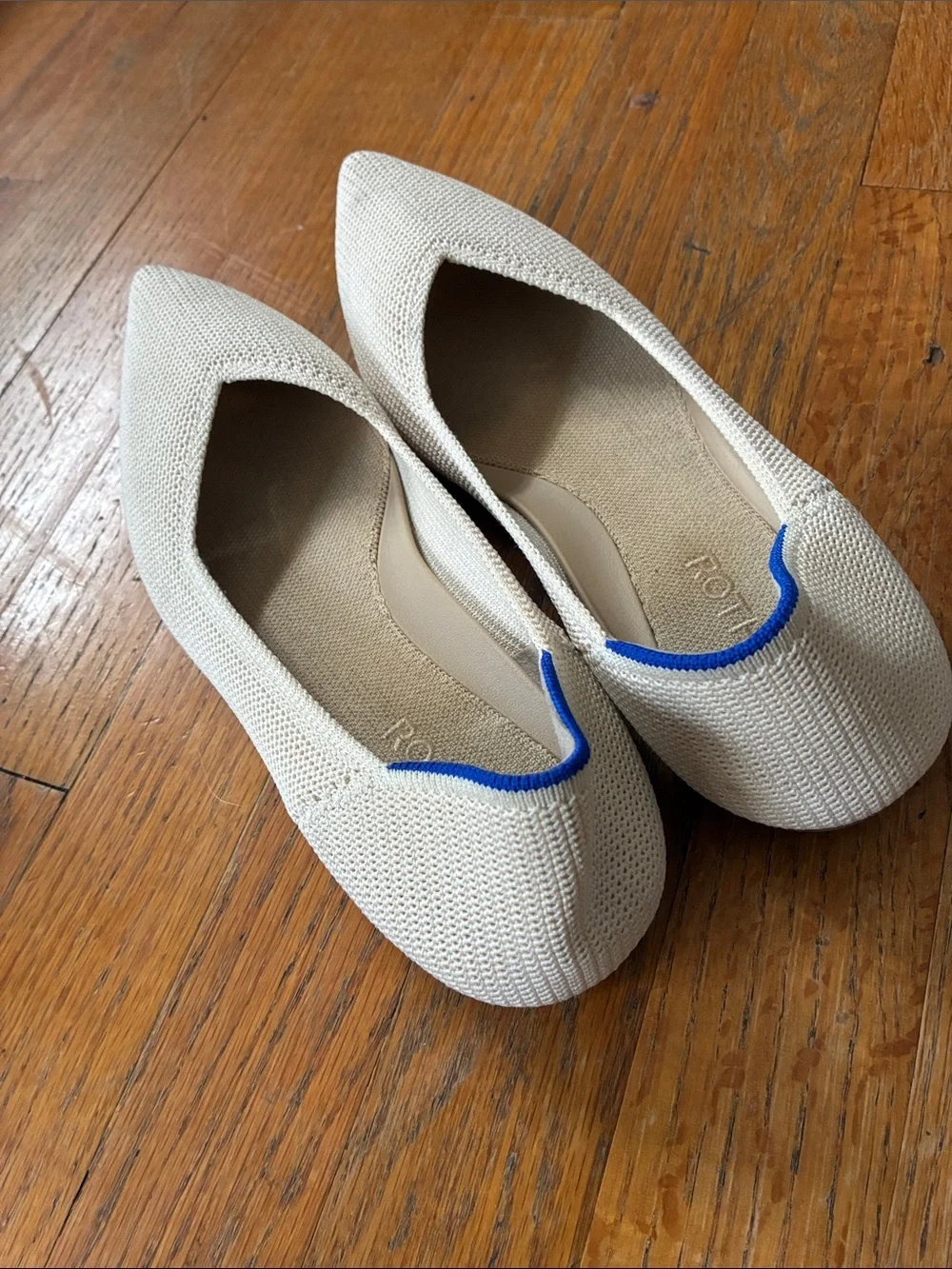 Rothy's Pointed Knit Flats in Cream with Blue Trim